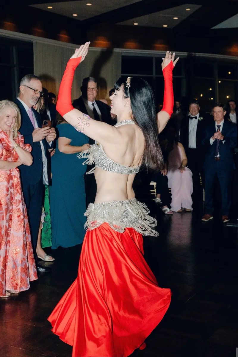 Reischa dancing at a live performance venue
