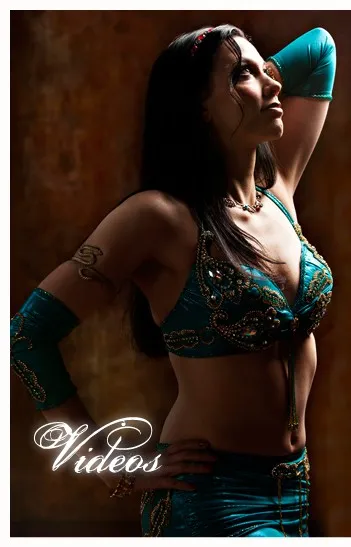 Reischa in a teal beaded costume
